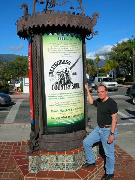 Director film maker Albert Ihde with Lobero Theatre kiosk for Bluegrass Country Soul film