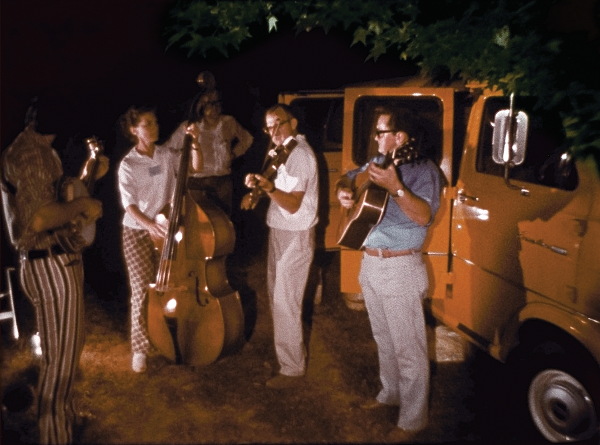 Group in the Field at Night